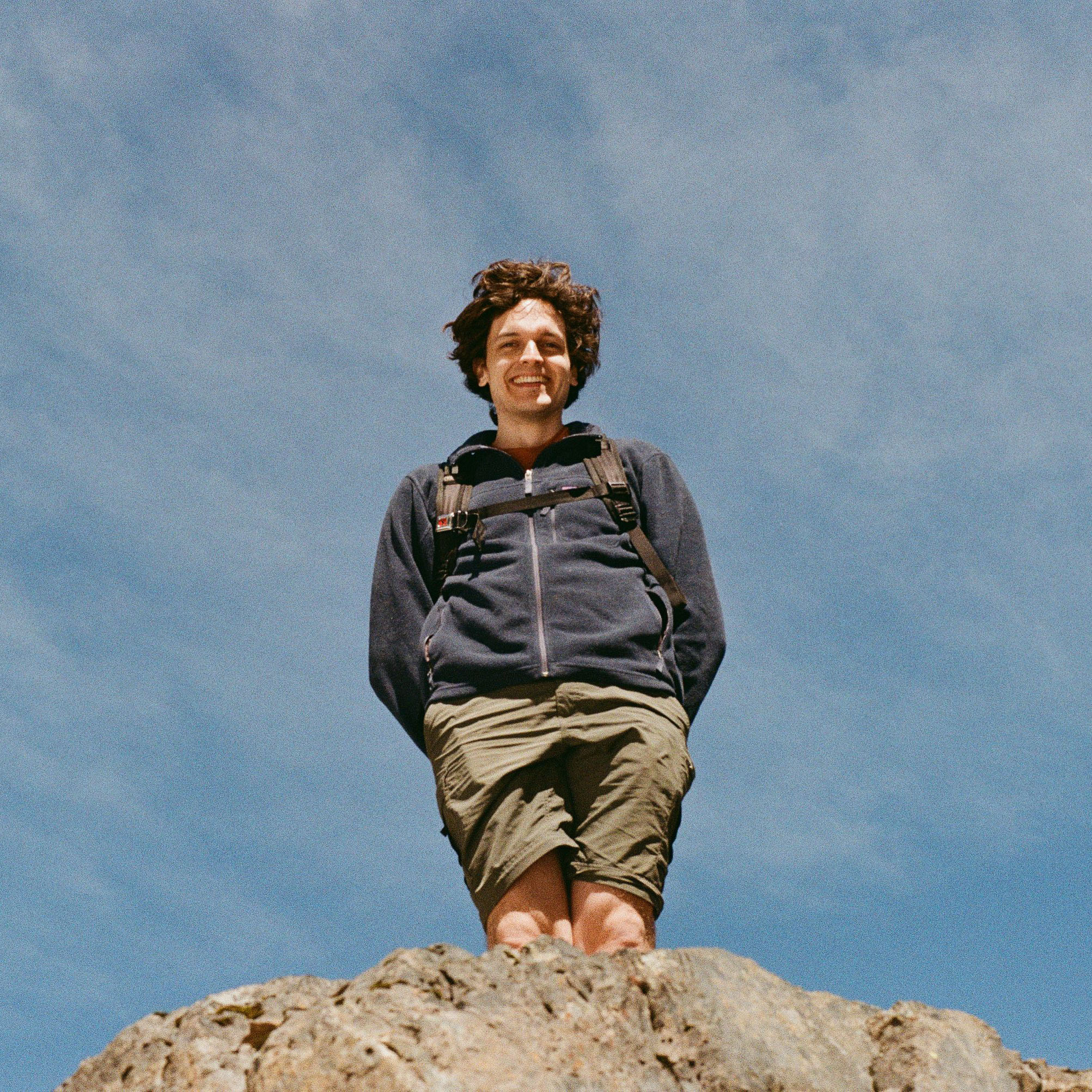 Ryan standing on a rock